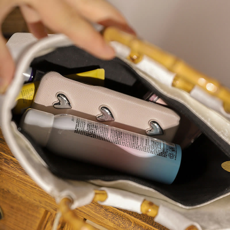 Bolsos de mano con borlas y asas de bambú bordadas con Buddha Stones