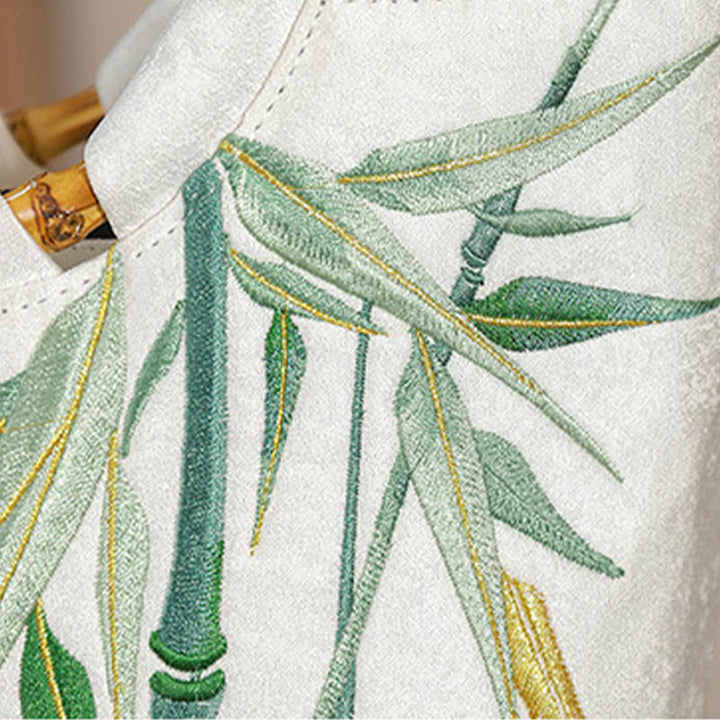 Bolsos de mano con borlas y asas de bambú bordadas con Buddha Stones