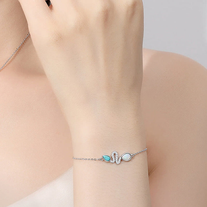 Pulsera de protección del año de la serpiente con ópalo turquesa y plata de ley 925 de Buddha Stones