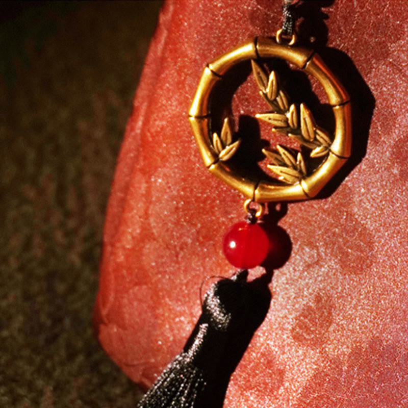 Buddha Stones Bolso de mano de seda Xiangyunsha con borlas bordadas con ramas de bambú y flores de ciruelo