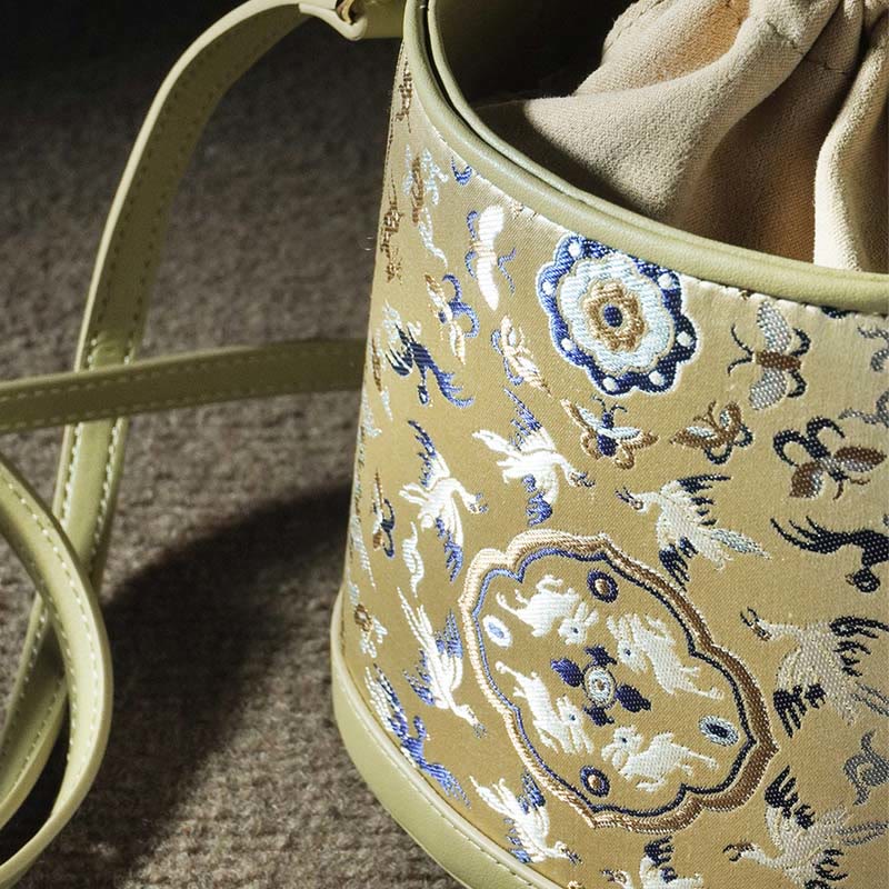 Bolso bandolera con brocado y diseño de ciervo, grulla y Buddha Stones