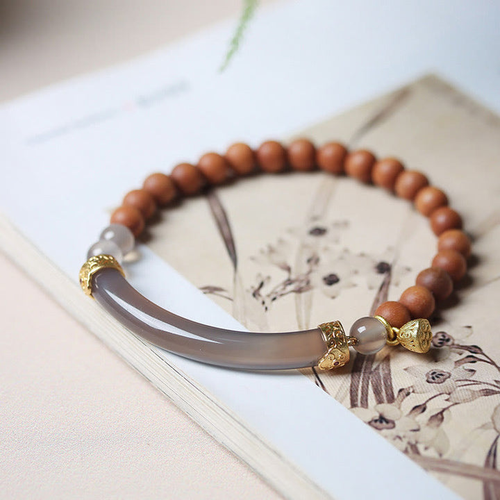 Brazalete tipo brazalete con Buddha Stones, sándalo, ágata gris y calcedonia