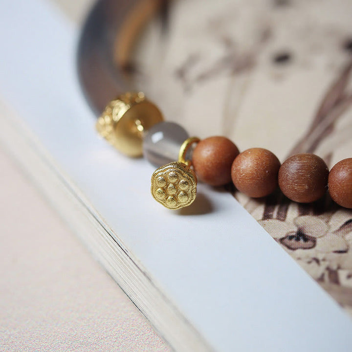Brazalete tipo brazalete con Buddha Stones, sándalo, ágata gris y calcedonia