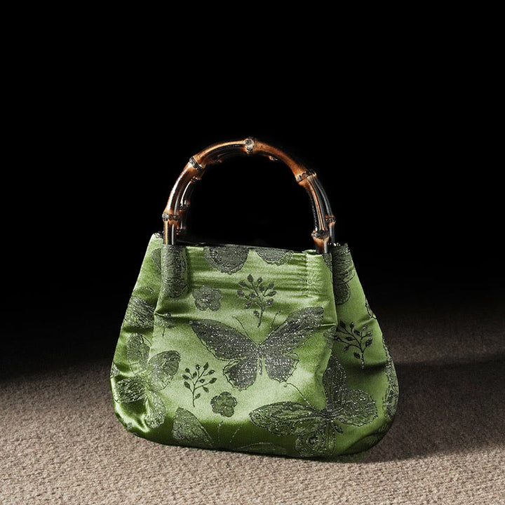 Bolso bandolera con cadena de metal y asa de bambú con diseño de Buddha Stones