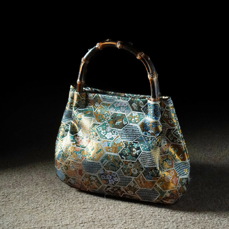 Bolso bandolera con cadena de metal y asa de bambú con diseño de Buddha Stones