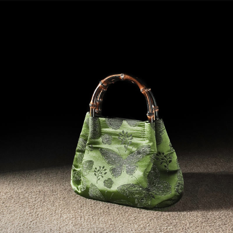 Bolso bandolera con cadena de metal y asa de bambú con diseño de Buddha Stones