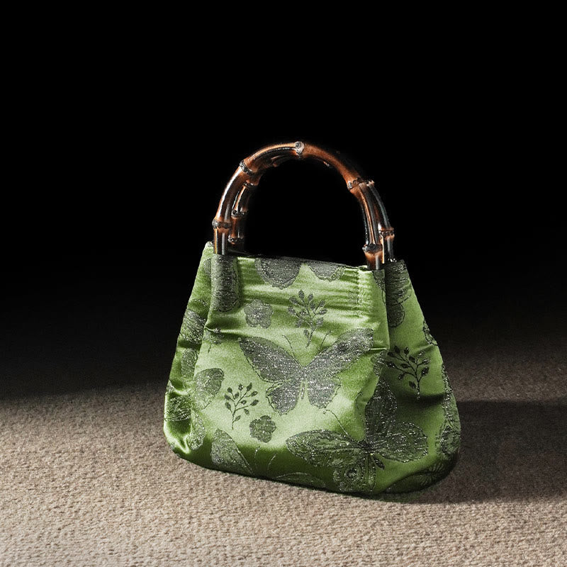 Bolso bandolera con cadena de metal y asa de bambú con diseño de Buddha Stones