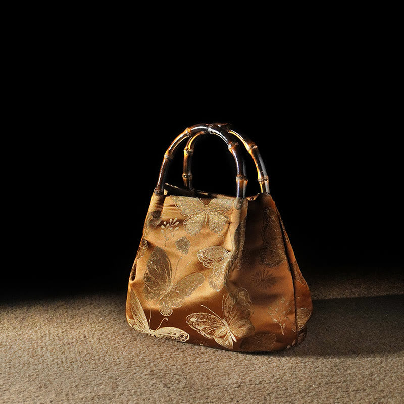 Bolso bandolera con cadena de metal y asa de bambú con diseño de Buddha Stones