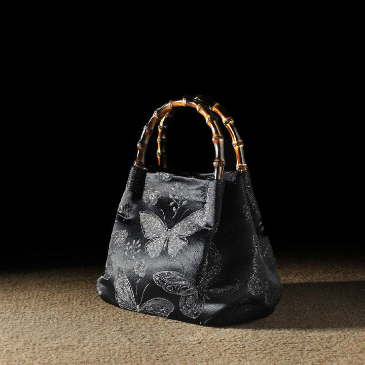 Bolso bandolera con cadena de metal y asa de bambú con diseño de Buddha Stones