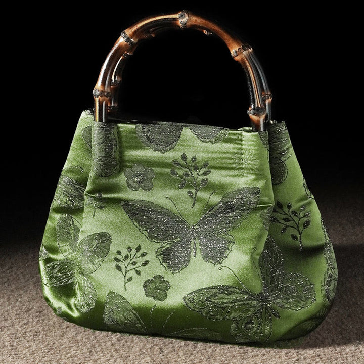 Bolso bandolera con cadena de metal y asa de bambú con diseño de Buddha Stones