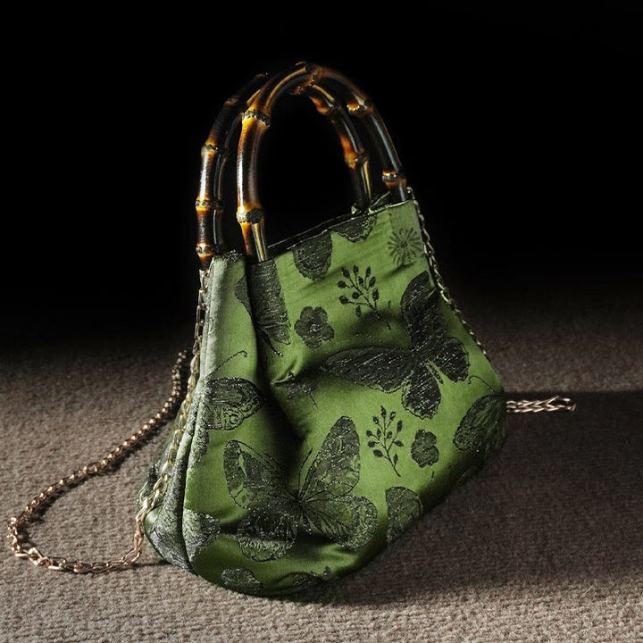 Bolso bandolera con cadena de metal y asa de bambú con diseño de Buddha Stones