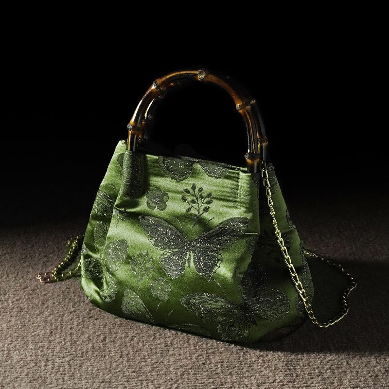 Bolso bandolera con cadena de metal y asa de bambú con diseño de Buddha Stones