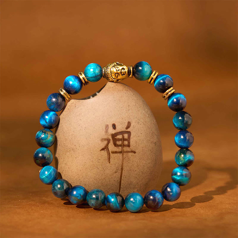 Pulsera de equilibrio con cabeza de Buda y ojo de tigre azul, verde y rojo con Buddha Stones