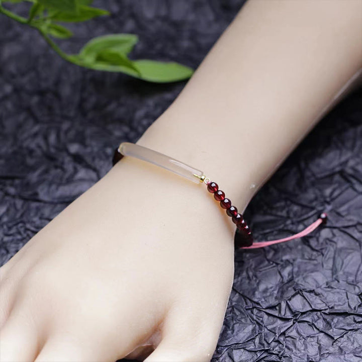 Brazalete tipo brazalete con Buddha Stones, granate, ágata gris y calma