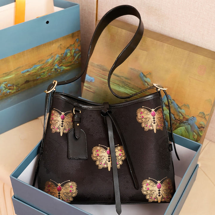 Bolso Buddha Stones con brocado hecho a mano con diseño de flores, grullas, ciervos y mariposas