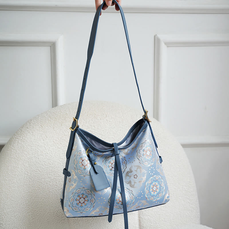 Bolso Buddha Stones con brocado hecho a mano con diseño de flores, grullas, ciervos y mariposas