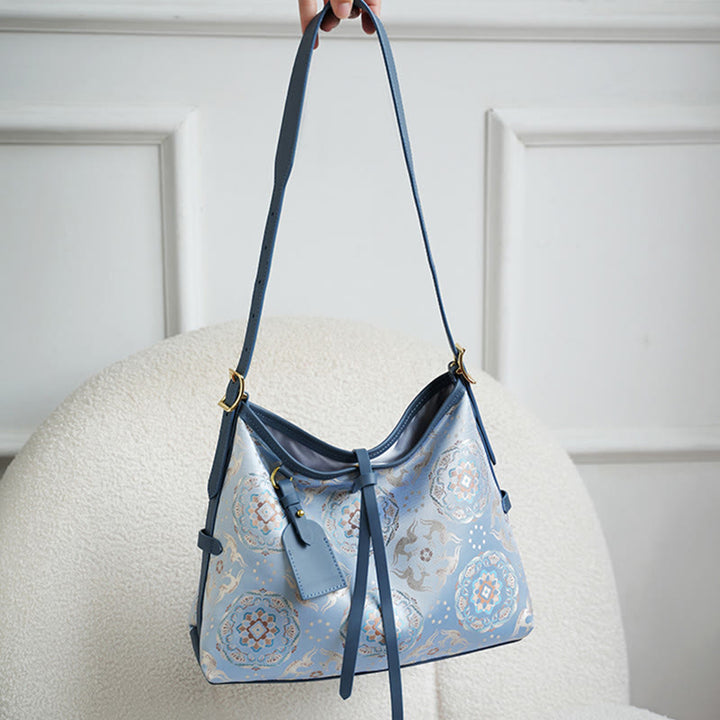 Bolso Buddha Stones con brocado hecho a mano con diseño de flores, grullas, ciervos y mariposas