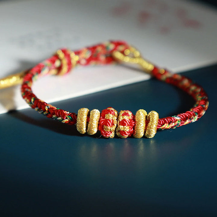 Pulsera de la suerte con Buddha Stones y Buda natal del zodíaco chino con cuerdas de colores