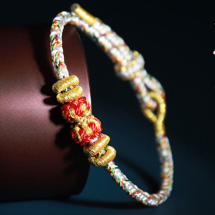 Pulsera de la suerte con Buddha Stones y Buda natal del zodíaco chino con cuerdas de colores