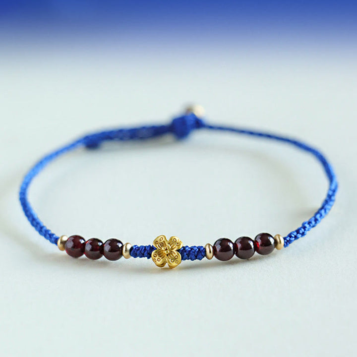 Pulsera Flower Power de cobre, granate, ágata roja del sur y hilo azul Klein de Buddha Stones