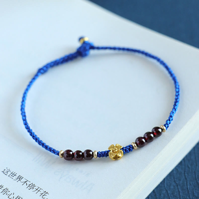 Pulsera Flower Power de cobre, granate, ágata roja del sur y hilo azul Klein de Buddha Stones