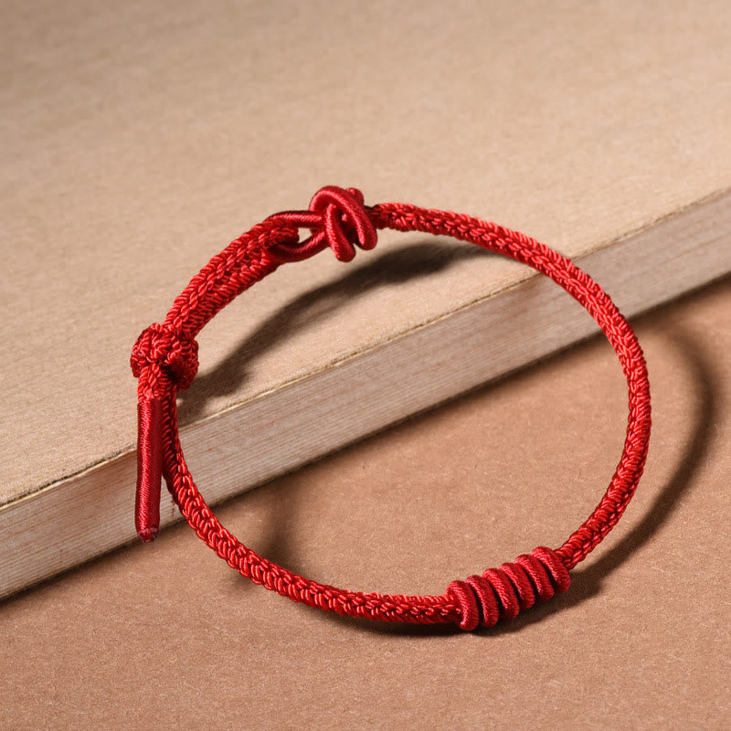 Pulsera de fuerza de ocho hilos con hilo rojo y Buddha Stones