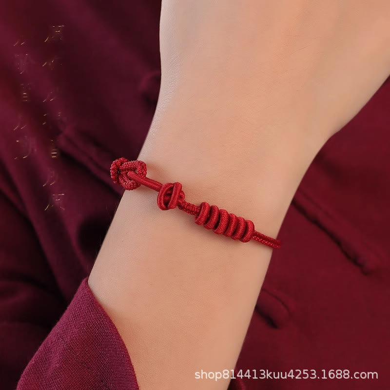 Pulsera de fuerza de ocho hilos con hilo rojo y Buddha Stones