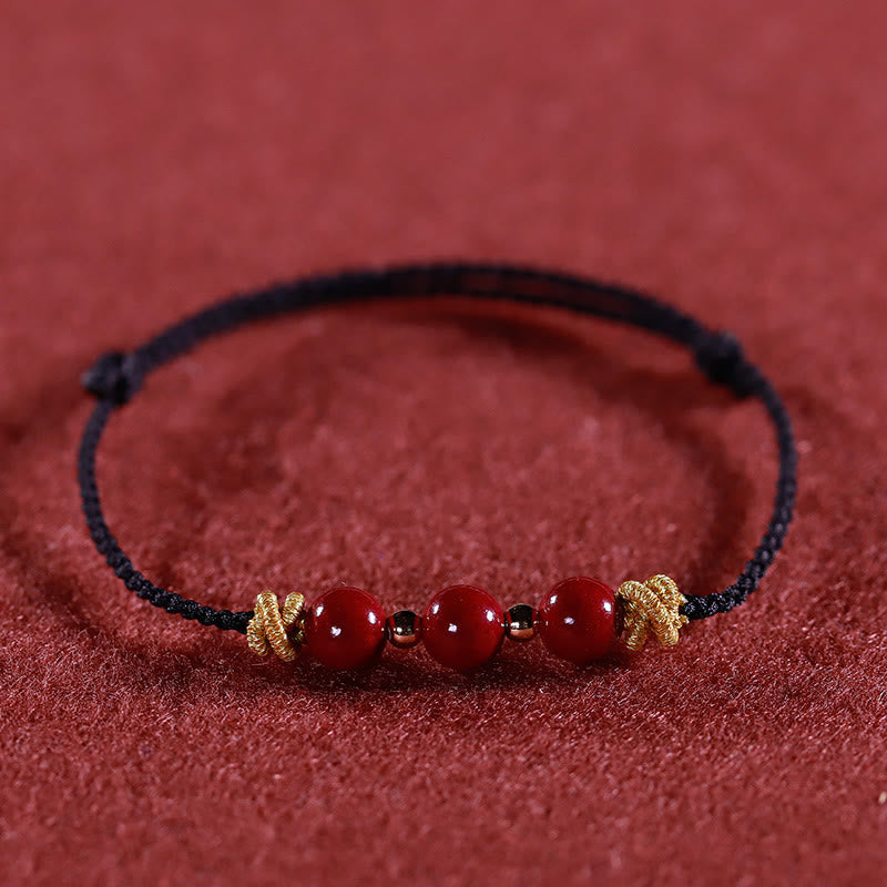 Pulsera de cinabrio con hilo colorido y Buddha Stones