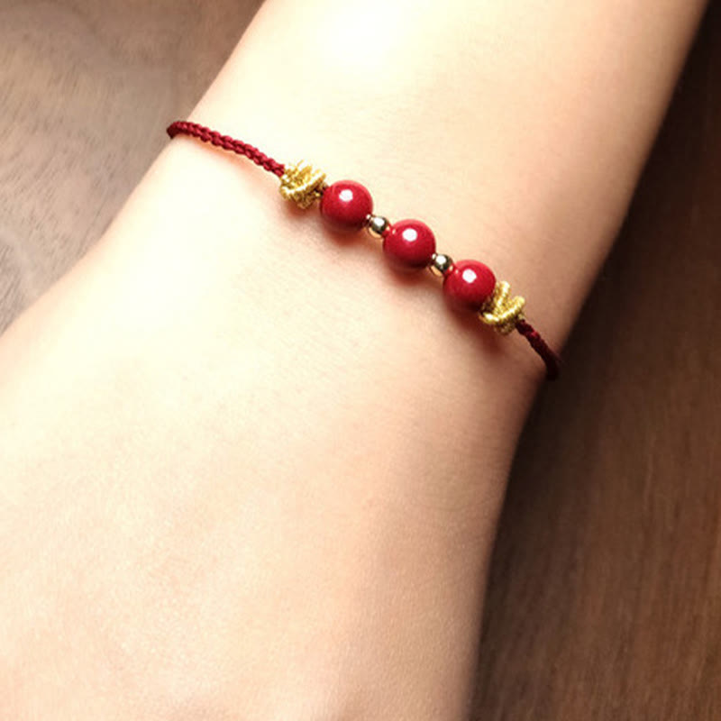 Pulsera de cinabrio con hilo colorido y Buddha Stones