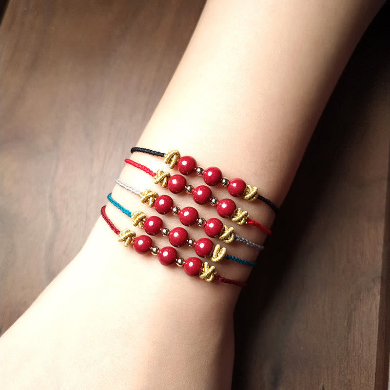 Pulsera de cinabrio con hilo colorido y Buddha Stones