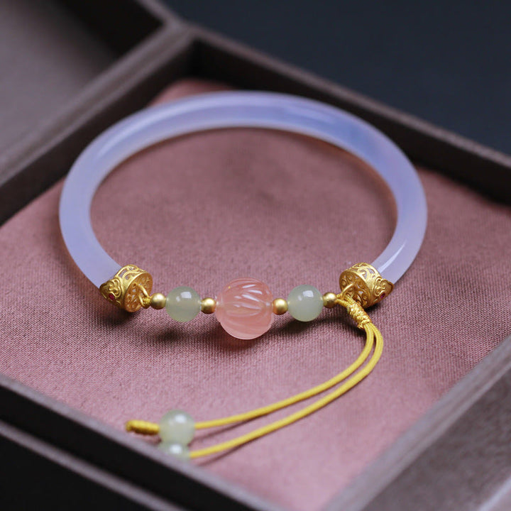 Pulsera positiva con cuentas de jade hetiano y loto de ágata blanca natural de Buddha Stones