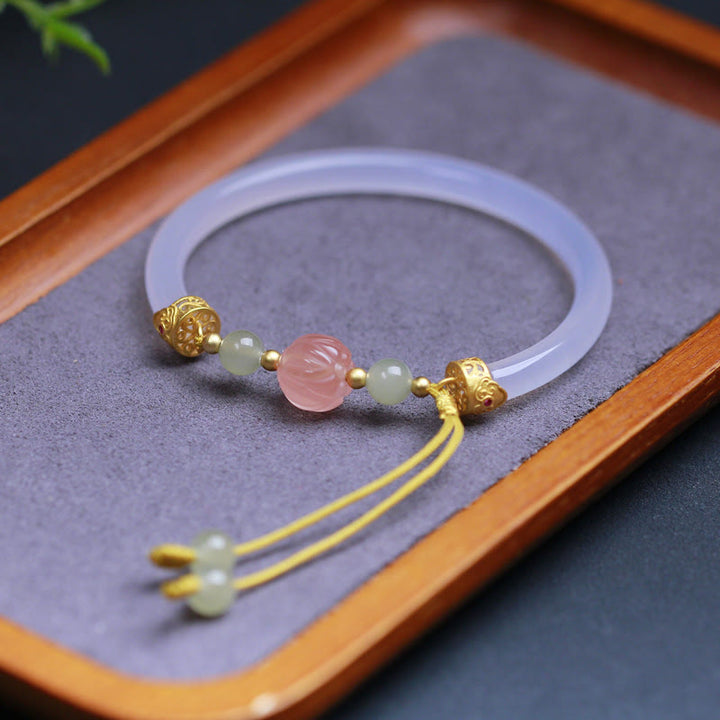 Pulsera positiva con cuentas de jade hetiano y loto de ágata blanca natural de Buddha Stones