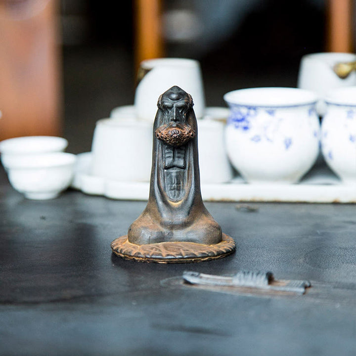 Estatua de resina fundida con óxido de hierro en polvo de Bodhidharma hecha a mano con Buddha Stones para decoración del hogar