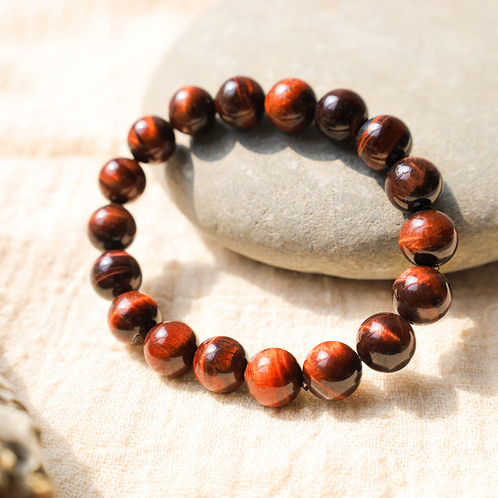Pulsera de confianza con varias Buddha Stones y ojo de tigre