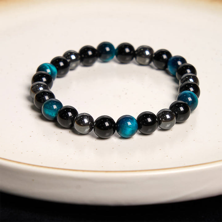 Pulsera de confianza con varias Buddha Stones y ojo de tigre