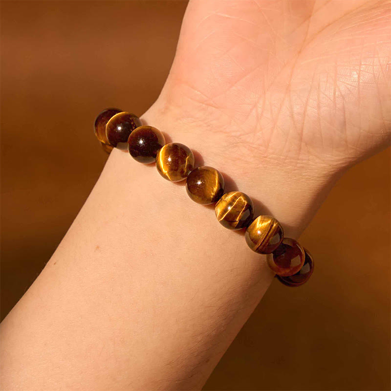 Pulsera de confianza con varias Buddha Stones y ojo de tigre