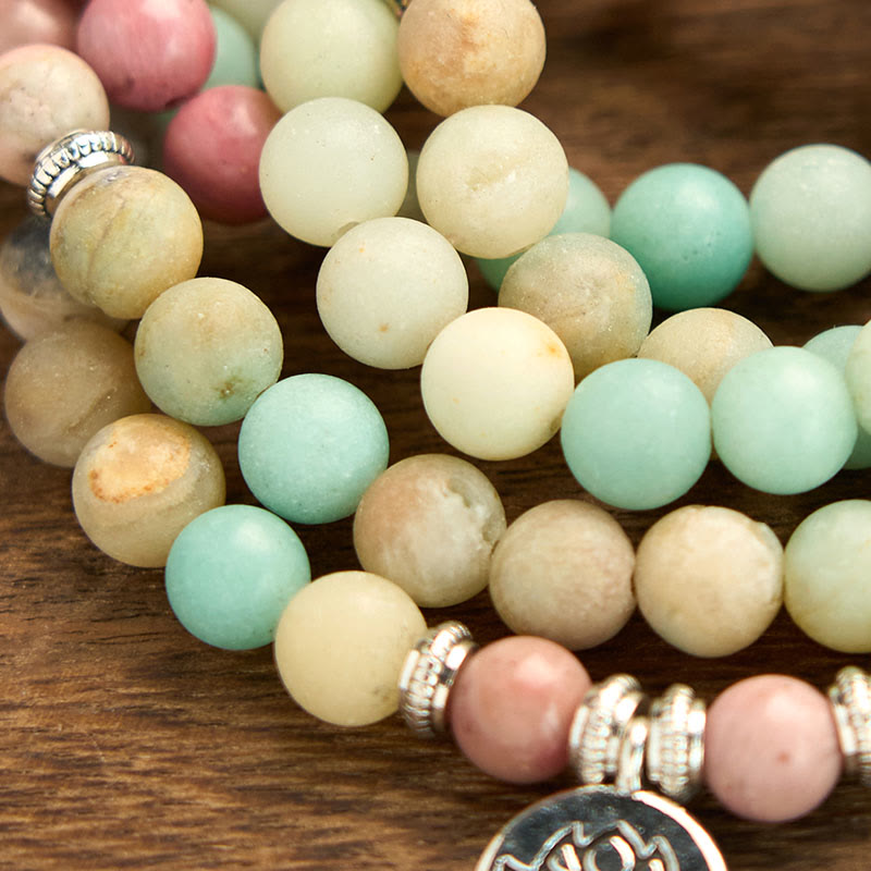 Pulsera de compasión de loto con 108 cuentas de amazonita y rodonita de Buddha Stones