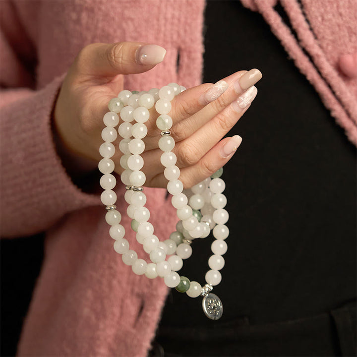Pulsera de la suerte con 108 cuentas de mala de jade natural Tianshan y loto de Buddha Stones