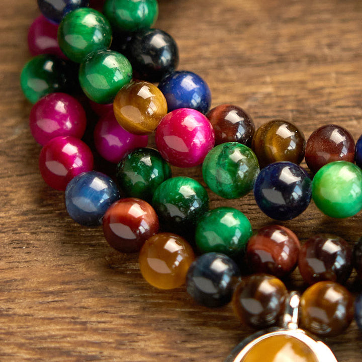 Pulsera de protección multivuelta con piedra de ojo de tigre de colores naturales y 108 cuentas de mala de Buddha Stones - image 6