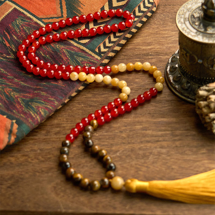 Buddha Stones con 108 cuentas de mala, ágata roja, ojo de tigre y borla amarilla