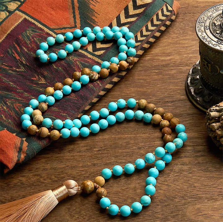 Pulsera de equilibrio con borlas y cuentas de jaspe con imagen turquesa y 108 cuentas de mala de Buddha Stones