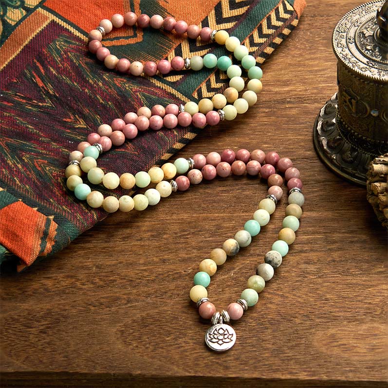 Pulsera de compasión de loto con 108 cuentas de amazonita y rodonita de Buddha Stones