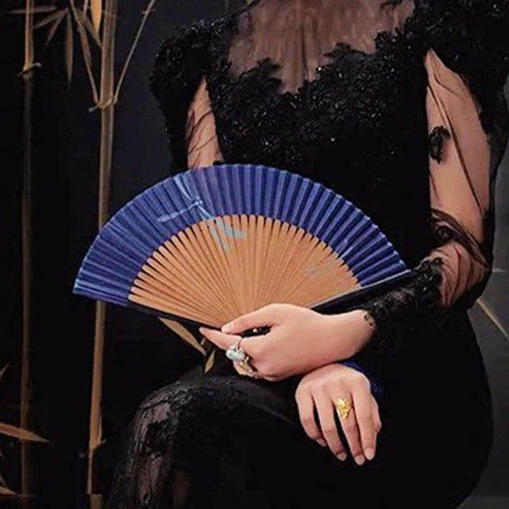 Abanico plegable de bambú con borlas de poliéster y diseño de libélula y Buddha Stones, 22 cm