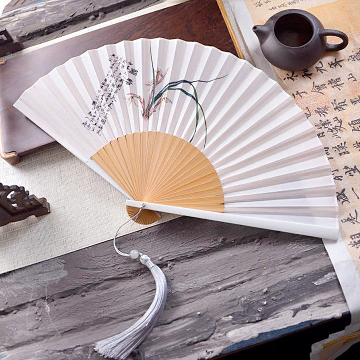 Abanico plegable de bambú y crepé de poliéster de 23,3 cm con pintura en tinta de caracteres chinos, diseño de flores de Buddha Stones y hojas