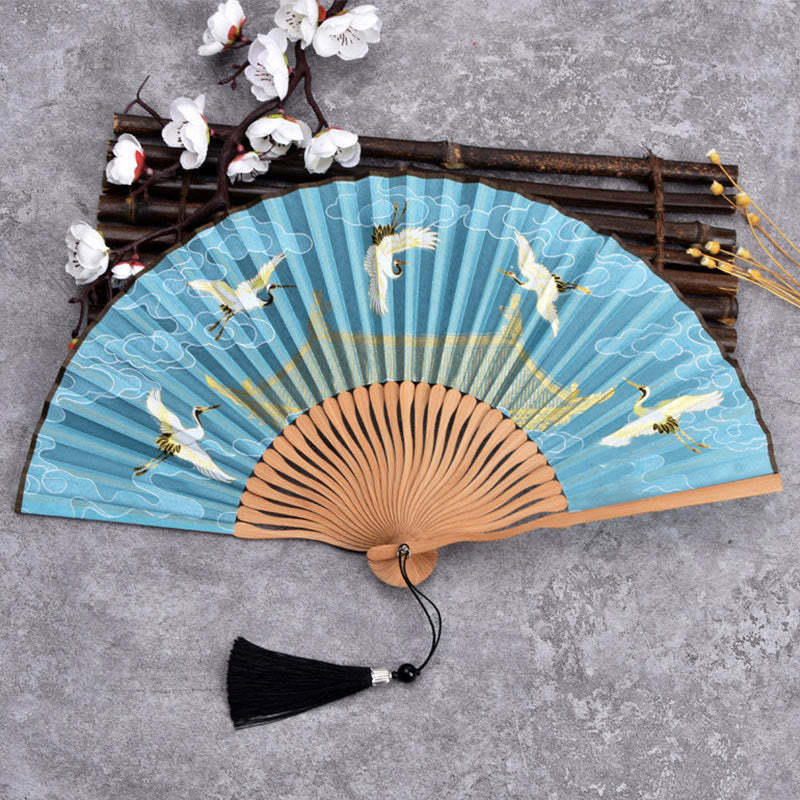 Ventilador plegable de bambú de mano con diseño de Buddha Stones, grullas y nubes auspiciosas, color sólido degradado. - Grulla Nube Azul 21cm - image 5