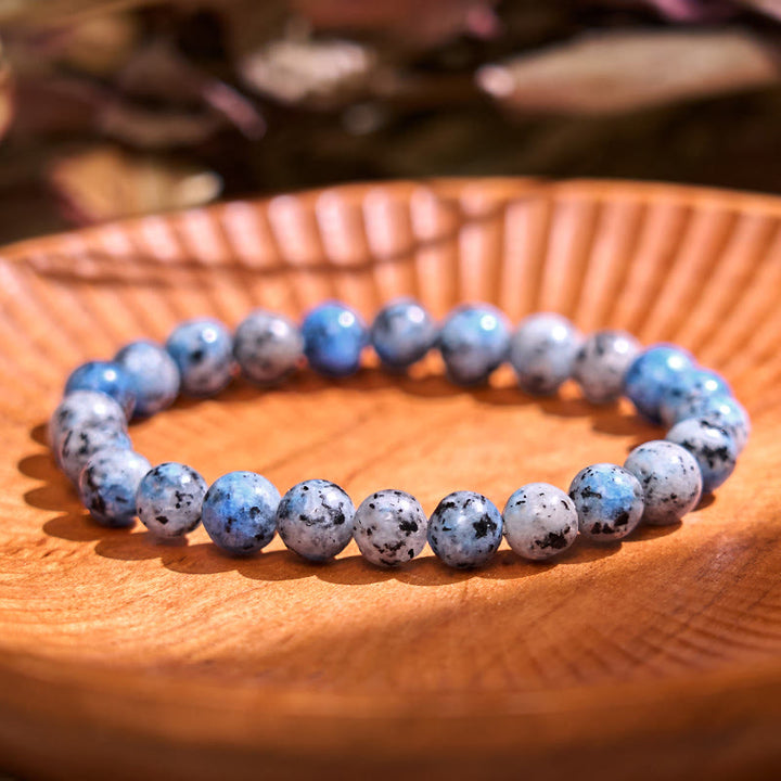 Pulsera de tranquilidad y calma de la serie azul Let The Past Go de Buddha Stones