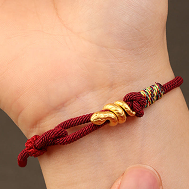 Pulsera trenzada de cuerda con diseño del año de la serpiente en oro 999 con Buddha Stones y protección de la suerte hecha a mano