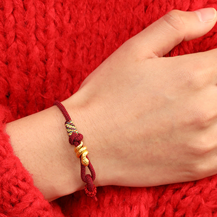 Pulsera trenzada de cuerda con diseño del año de la serpiente en oro 999 con Buddha Stones y protección de la suerte hecha a mano