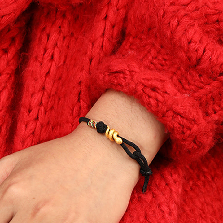 Pulsera trenzada de cuerda con diseño del año de la serpiente en oro 999 con Buddha Stones y protección de la suerte hecha a mano