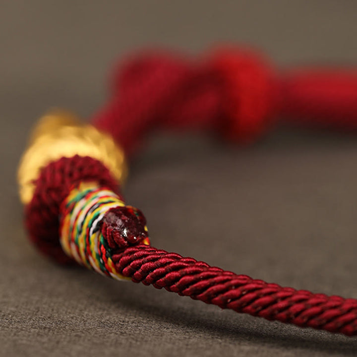 Pulsera trenzada de cuerda con diseño del año de la serpiente en oro 999 con Buddha Stones y protección de la suerte hecha a mano